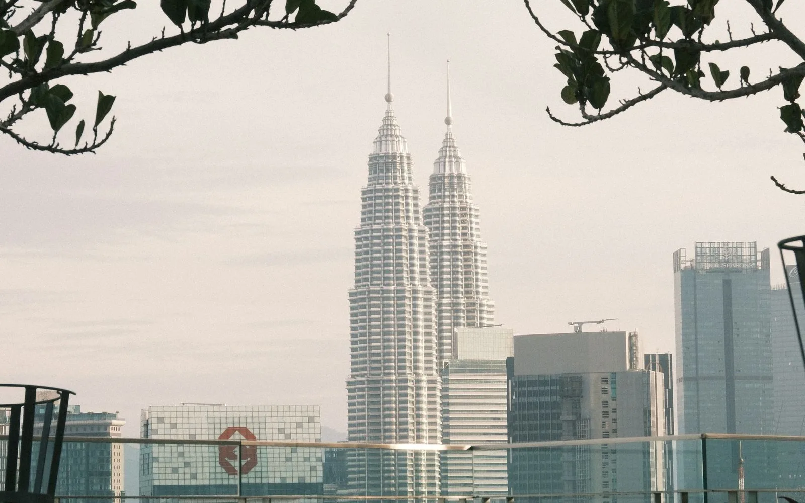 Petronas Twin Towers and the Kuala Lumpur skyline seen from a rooftop terrace in Bukit Bintang Petronas Twin Towers and the Kuala Lumpur skyline seen from a rooftop terrace in Bukit Bintang
